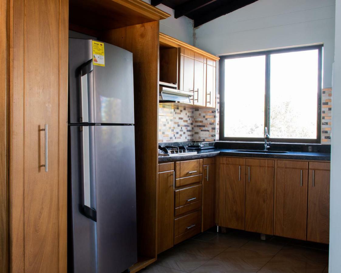 Guatapé Happy Buddha Hostel & Lodge מראה חיצוני תמונה